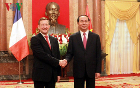 
President Quang and French Ambassador Bertrand Lortholary
