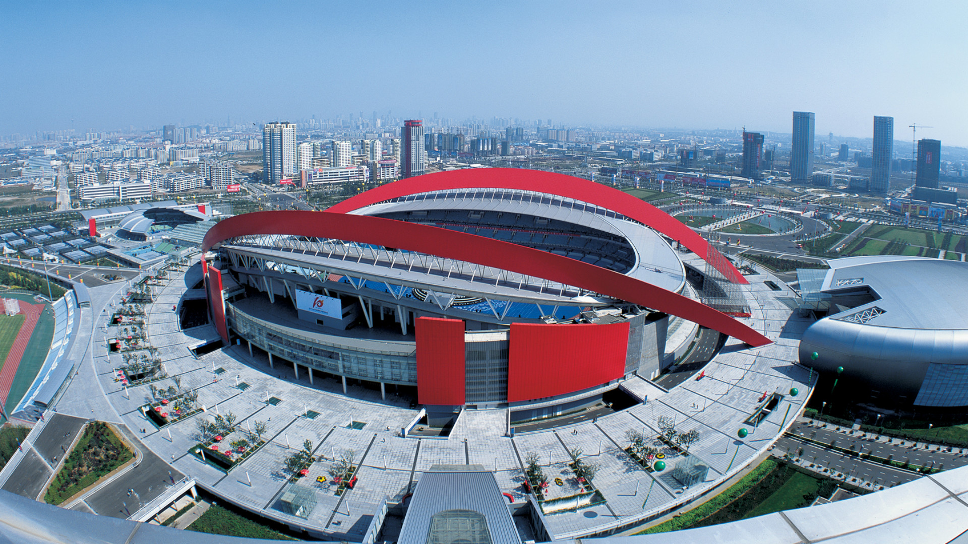 Center stadium. Нанкин Олимпик Спортс центр Стэдиум. Стадион в Нанкине. Nanjing Olympic Sports Center. Шэньян стадион.
