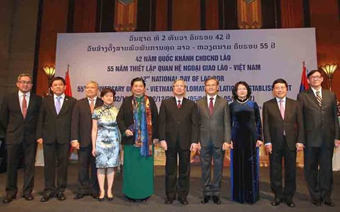 Lãnh đạo cấp cao Việt Nam dự kỷ niệm Quốc khánh Lào - Ảnh 1.