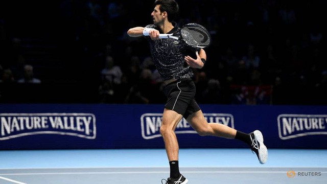 ATP Finals: Djokovic dễ dàng vượt ải Zverev, Cilic thắng ngược Isner - Ảnh 1.