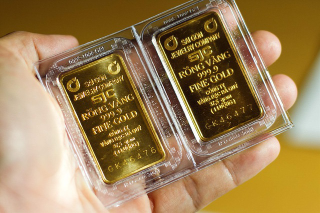 Giá vàng trong nước tiến sát lên mốc 57 triệu đồng/lượng - Ảnh 1.