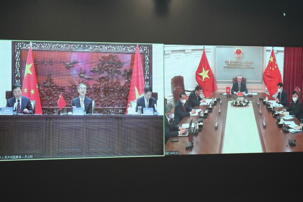 Tòa án nhân dân tối cao Việt Nam - Trung Quốc hội đàm trực tuyến - Ảnh 1.