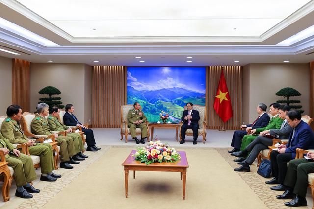 Tăng cường hợp tác an ninh Việt - Lào trong bối cảnh nhiều biến động, khó khăn, thách thức - Ảnh 2.