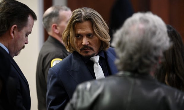 Johnny Depp bị gọi là gã chồng cũ bị ám ảnh về việc trả thù trong phiên toà chống lại vợ cũ - Ảnh 1.