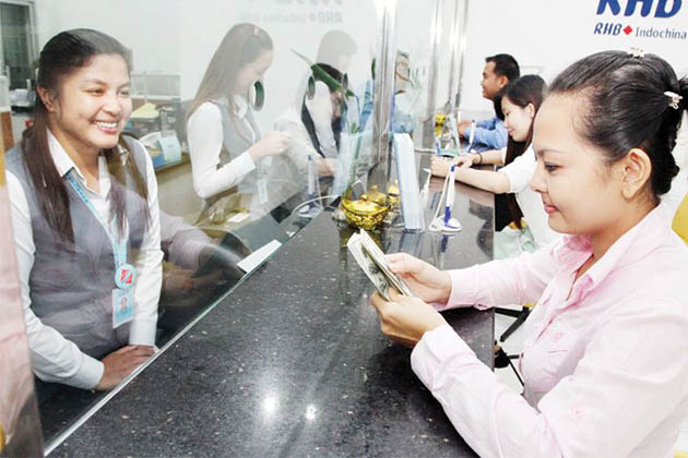Nhà đầu tư nước ngoài phải mở tài khoản ngân hàng tại Lào - Ảnh 1.