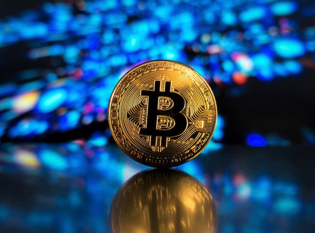 Bitcoin vượt 71.000 USD - Ảnh 1.