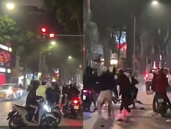 Nhóm thanh thiếu niên cầm xẻng đánh người trên đường phố Hà Nội - Ảnh 1.