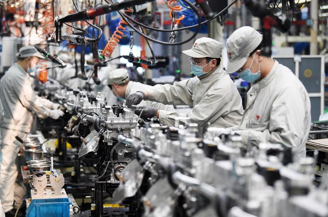 Kinh tế Trung Quốc tăng trưởng vượt dự báo - Ảnh 1.