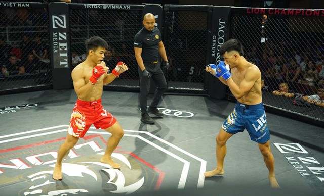 Trần Ngọc Lượng hạ đẹp học trò Johnny Trí Nguyễn trên sàn MMA - Ảnh 1.