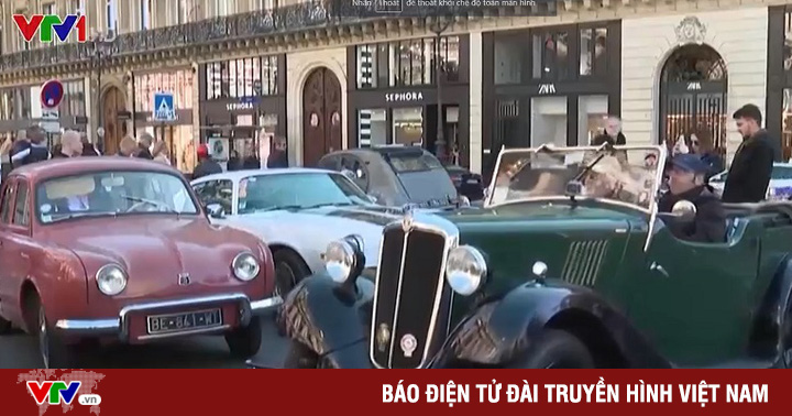 Classic car parade in Paris, France