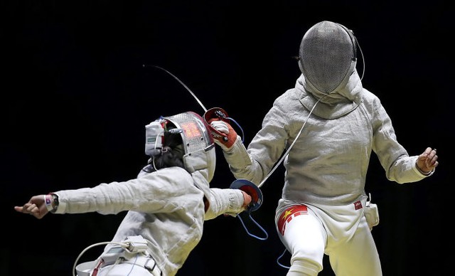 
Lệ Dung (phải) đã dừng bước ở Olympic Rio 2016 khi thất bại trước nhà ĐKVĐ Olympic, Kim Ji-Yeon (Hàn Quốc). Ảnh: Reuters
