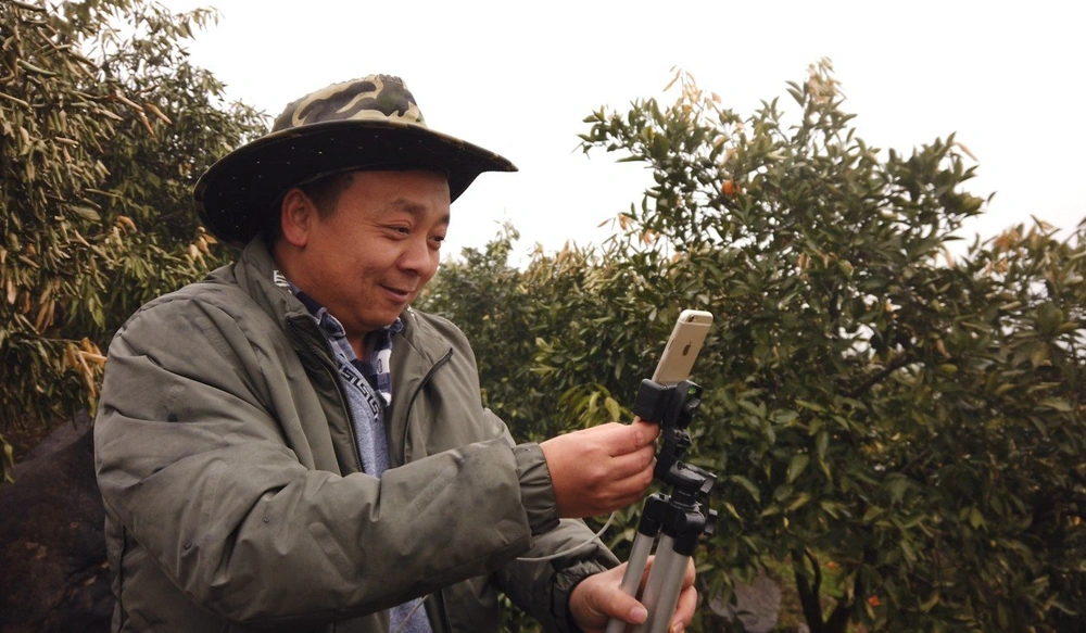 Nông dân Trung Quốc đổi đời nhờ livestream, thương mại điện tử nông thôn bùng nổ - Ảnh 4.
