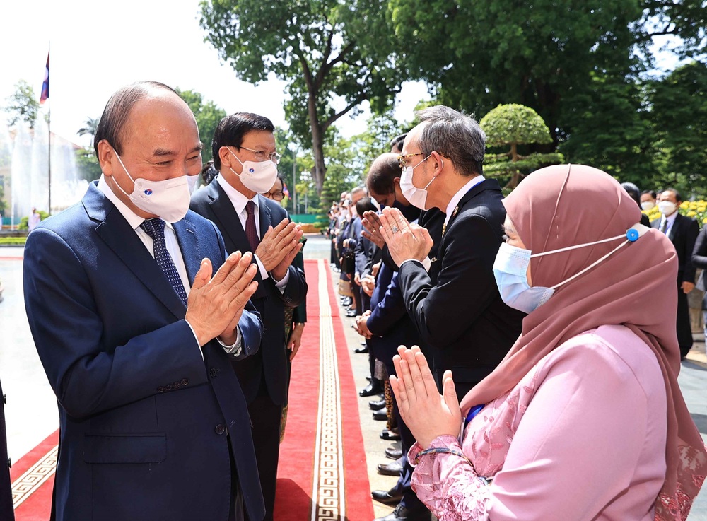 [ẢNH] Lễ đón Tổng Bí thư, Chủ tịch nước Lào Thongloun Sisoulith thăm hữu nghị chính thức Việt Nam - Ảnh 21.
