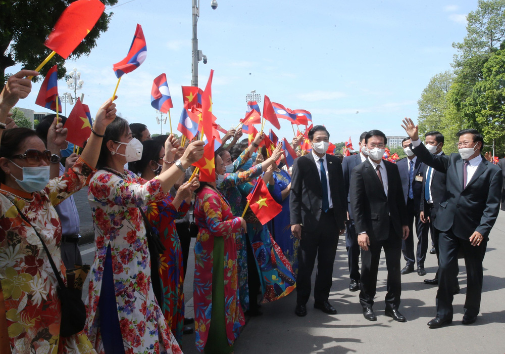[ẢNH] Lễ đón Tổng Bí thư, Chủ tịch nước Lào Thongloun Sisoulith thăm hữu nghị chính thức Việt Nam - Ảnh 1.