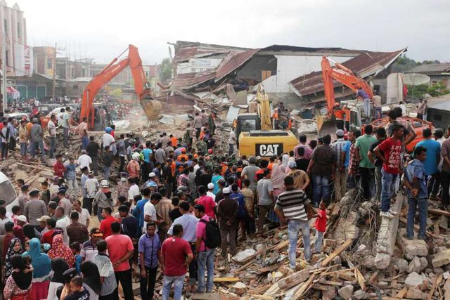 Động đất tại Indonesia gây thiệt hại lớn về người và tài sản - Ảnh 6.