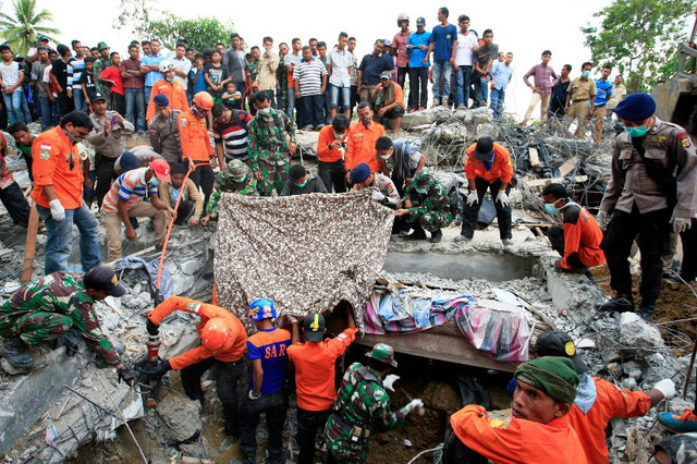 Động đất tại Indonesia gây thiệt hại lớn về người và tài sản - Ảnh 9.