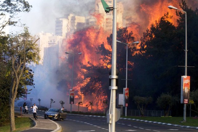Cháy rừng nghiêm trọng tại Israel, khoảng 50.000 người phải sơ tán - Ảnh 4.