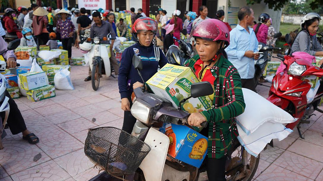 1.500 suất quà đến với người dân vùng lũ Quảng Bình - Ảnh 2.