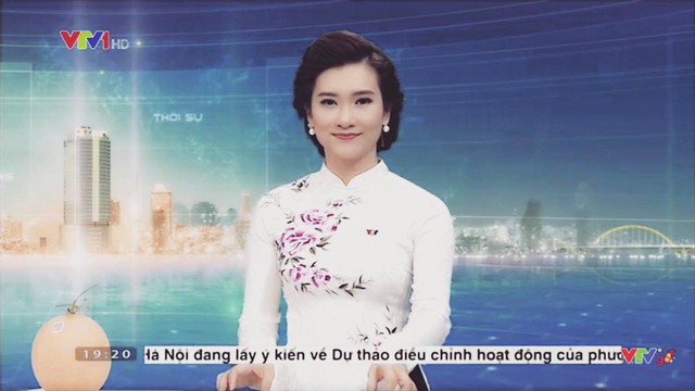 BTV Khánh Trang với những chiếc áo dài gây thương nhớ trong Bản tin 19h - Ảnh 10.