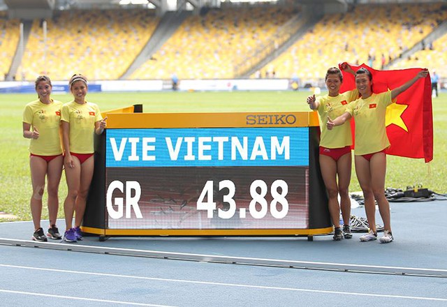 Tú Chinh và đồng đội xuất sắc phá kỷ lục SEA Games nội dung 4x100m - Ảnh 1.