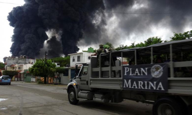 Cháy tại nhà máy lọc dầu ở Mexico, 9 người bị thương - Ảnh 1.