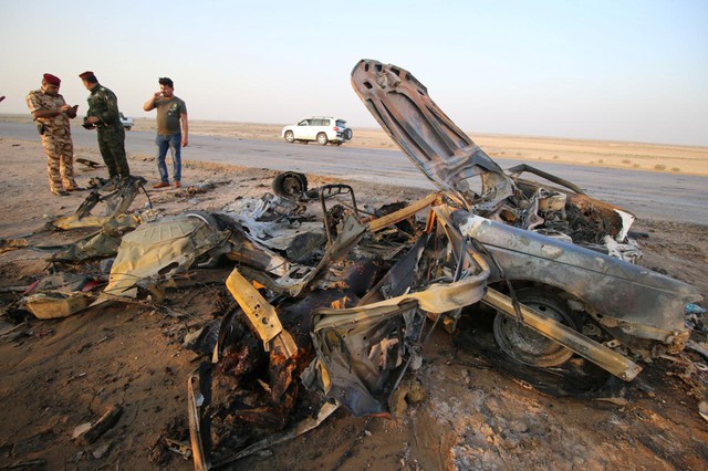 Iraq: IS đánh bom nhà hàng và trạm kiểm soát , 60 người thiệt mạng - Ảnh 1.