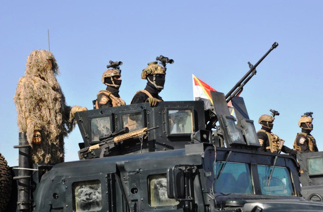 Iraq diễu binh mừng chiến thắng IS - Ảnh 3.