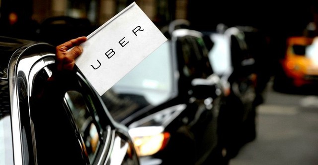 Cuộc đấu tranh giữa taxi và Uber tại New York - Ảnh 1.