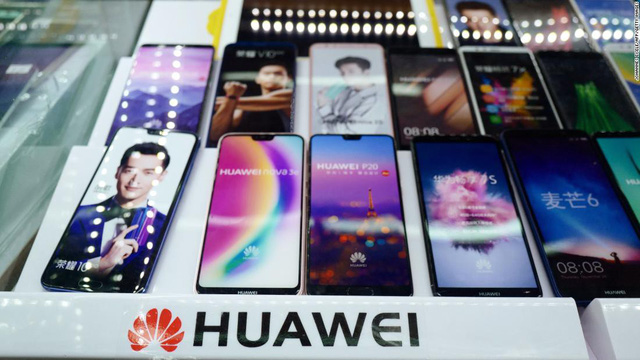 Hàng trăm công ty Trung Quốc ép buộc nhân viên tẩy chay Apple, chuyển sang dùng Huawei - Ảnh 1.