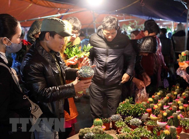Bất chấp trời mưa rét, hội chợ Viềng Nam Định vẫn tấp nập - Ảnh 7.