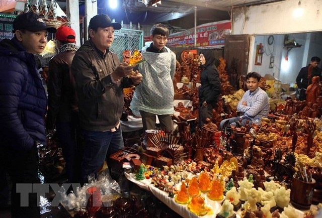 Bất chấp trời mưa rét, hội chợ Viềng Nam Định vẫn tấp nập - Ảnh 9.