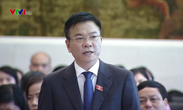 Bộ trưởng Bộ Tư pháp Lê Thành Long trả lời chất vấn - Ảnh 1.