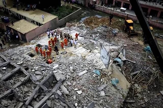 Sập tòa nhà tại Ấn Độ làm 9 người thiệt mạng - Ảnh 4.