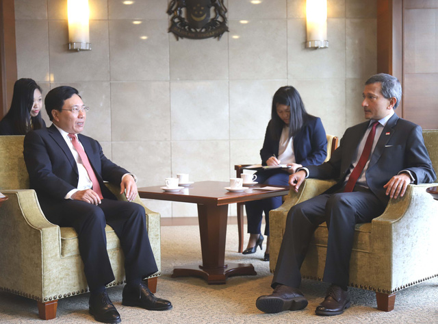 Phó Thủ tướng Phạm Bình Minh thăm chính thức Singapore - Ảnh 5.