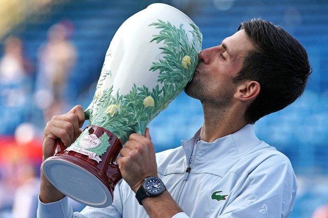 Đánh bại Federer, Novak Djokovic đi vào lịch sử với Golden Masters - Ảnh 1.