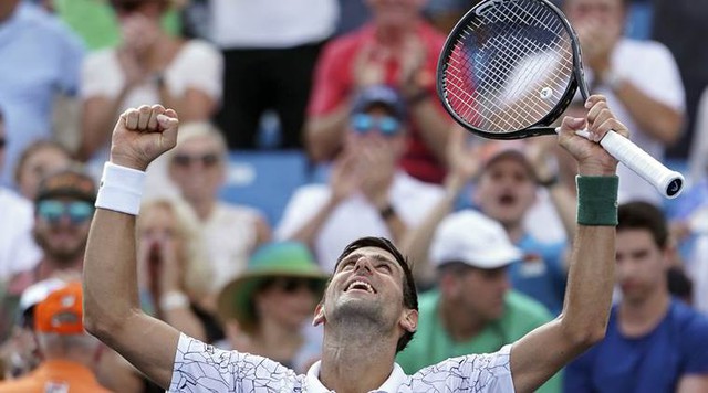 Đánh bại Federer, Novak Djokovic đi vào lịch sử với Golden Masters - Ảnh 3.