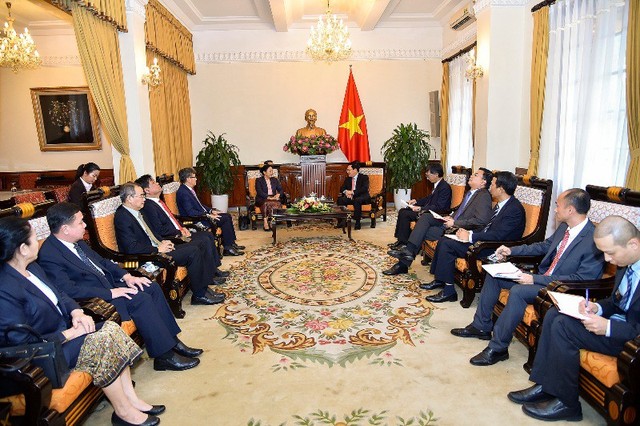 Phó Thủ tướng Phạm Bình Minh tiếp Thứ trưởng Bộ Ngoại giao Lào - Ảnh 1.