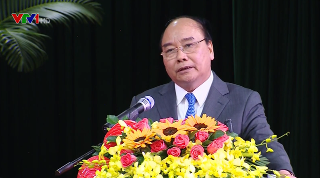 Thủ tướng Nguyễn Xuân Phúc gặp mặt và chúc Tết cán bộ hưu trí tại các tỉnh miền Trung - Ảnh 1.