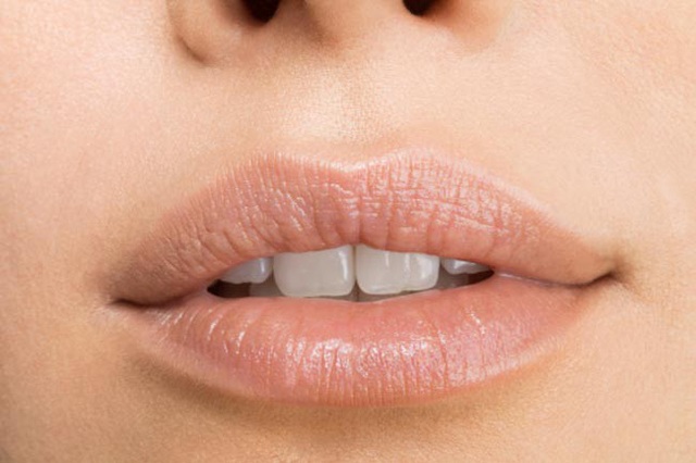 Nhận biết tình trạng sức khỏe qua các dấu hiệu của miệng - Ảnh 12.