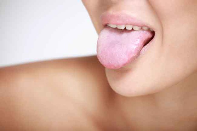 Nhận biết tình trạng sức khỏe qua các dấu hiệu của miệng - Ảnh 6.