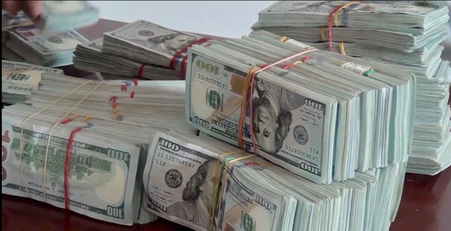 Tìm chủ nhân 470.000 USD trong hộp giấy ở biên giới Campuchia - Ảnh 1.
