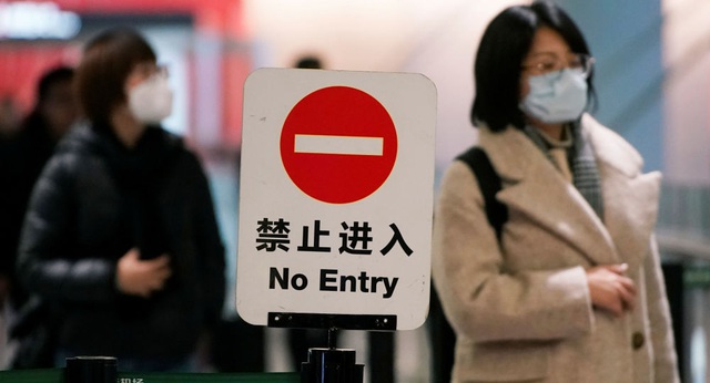 Công ty du lịch tại Trung Quốc cho phép du khách hủy đặt chỗ tại Vũ Hán - Ảnh 1.