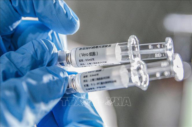 Trung Quốc cung cấp vaccine COVID-19 thử nghiệm giá 60 USD - Ảnh 1.