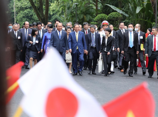 Thủ tướng Nguyễn Xuân Phúc chủ trì Lễ đón Thủ tướng Nhật Bản - Ảnh 5.