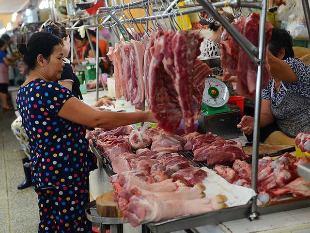 Thịt lợn nhập khẩu đổ về Việt Nam - Ảnh 1.
