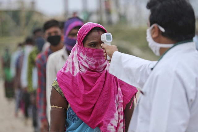 Hơn 75,8 triệu người mắc COVID-19 trên thế giới, số ca nhiễm tại Ấn Độ vượt mốc 10 triệu - Ảnh 1.