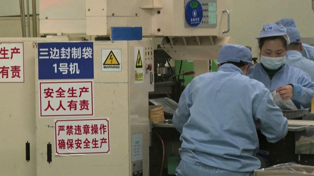Trung Quốc: Các nhà máy dần trở lại làm việc giữa mùa dịch 2019-nCoV - Ảnh 1.