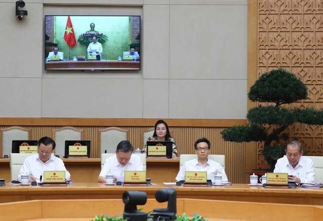 Thủ tướng Nguyễn Xuân Phúc: Quyết tâm cao để tiếp tục tháo gỡ khó khăn do COVID-19 gây ra - Ảnh 3.
