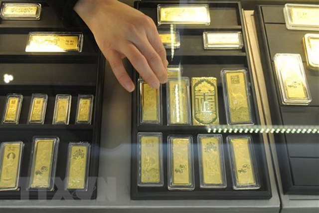 Giá vàng trong nước tăng vọt, vượt mốc 49,5 triệu đồng/lượng - Ảnh 2.