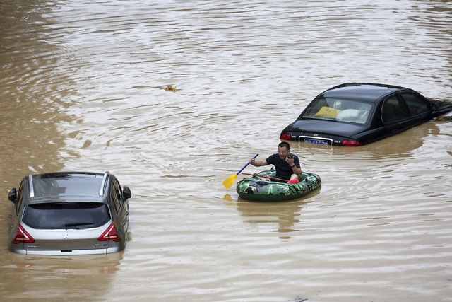 Thêm ít nhất 14 người thiệt mạng vì mưa lũ nghiêm trọng tại Trung Quốc - Ảnh 2.